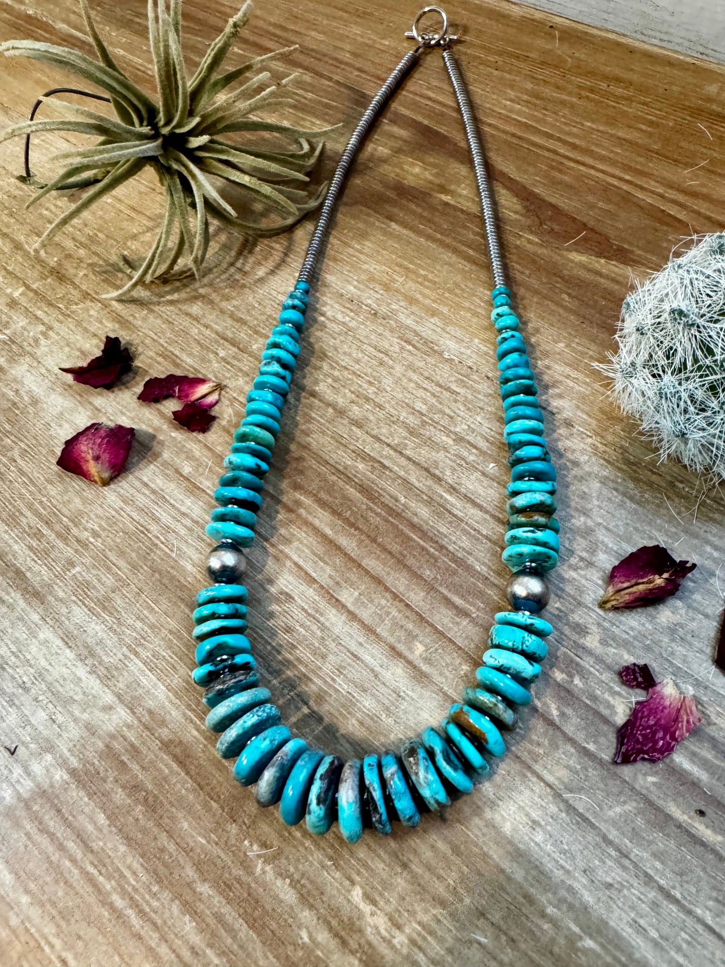 22 inch graduated turquoise necklace with Sterling silver pearls